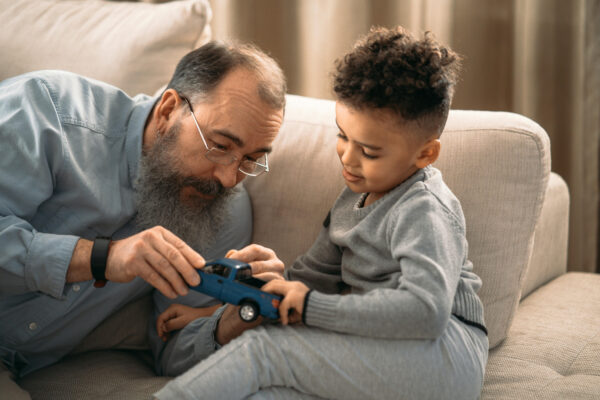 6.-The-pros-and-cons-of-choosing-a-living-legacy-over-leaving-an-inheritance_proofed_FINAL photo of father and son