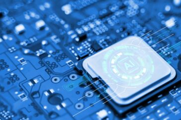 A computer central processing unit with “AI” written on it.