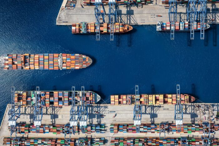 An aerial view of a cargo ship harbour.