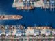 An aerial view of a cargo ship harbour.