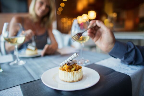 couple enjoying beautifful meal in restaurant