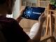 Someone using an AI assistant on a tablet.