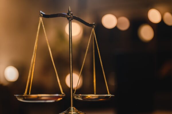 LM Financial July balanced scales