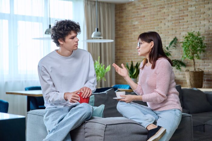 mum talking to 18 year old son