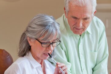couple looking at paperwork