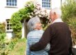 couple in front of their home